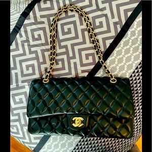 Black and gold replica bag